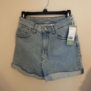 Never worn H&M light wash Jean shorts. Size:4